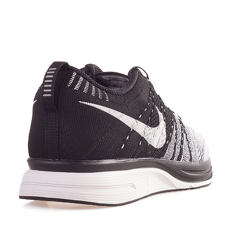 Nike flyknit trainer black and clearance white